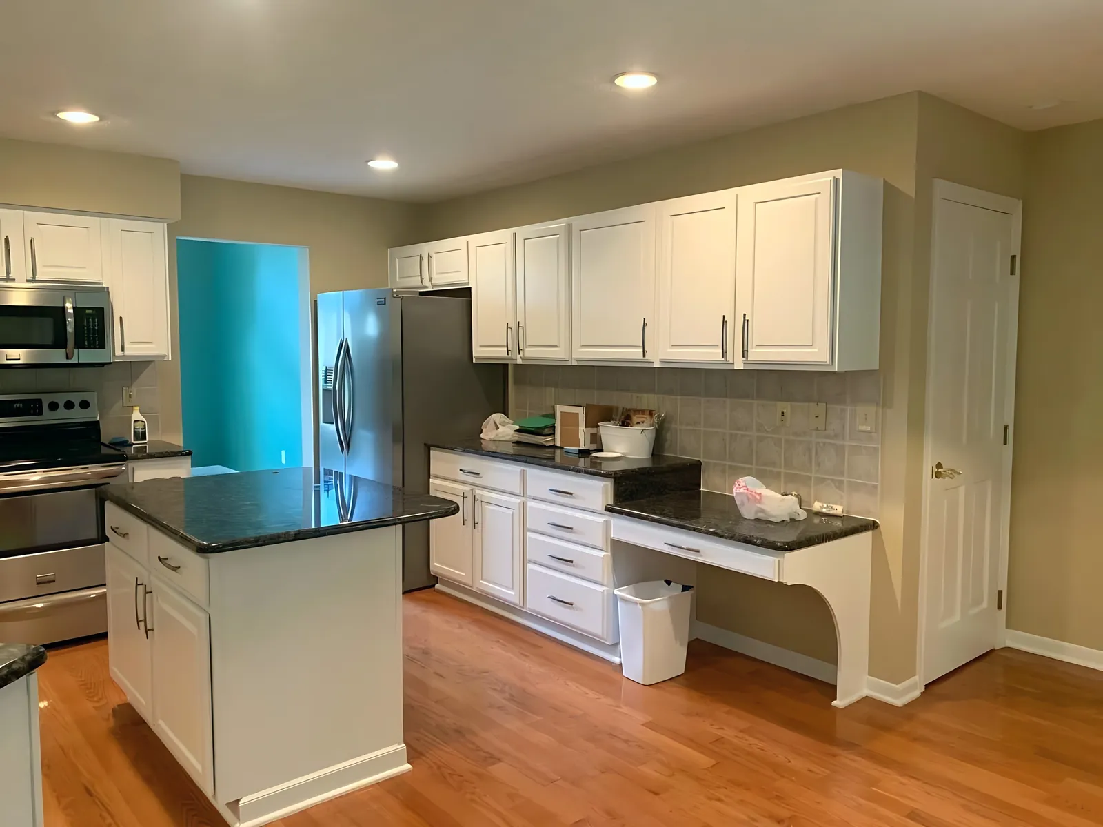 After: oak cabinets to white