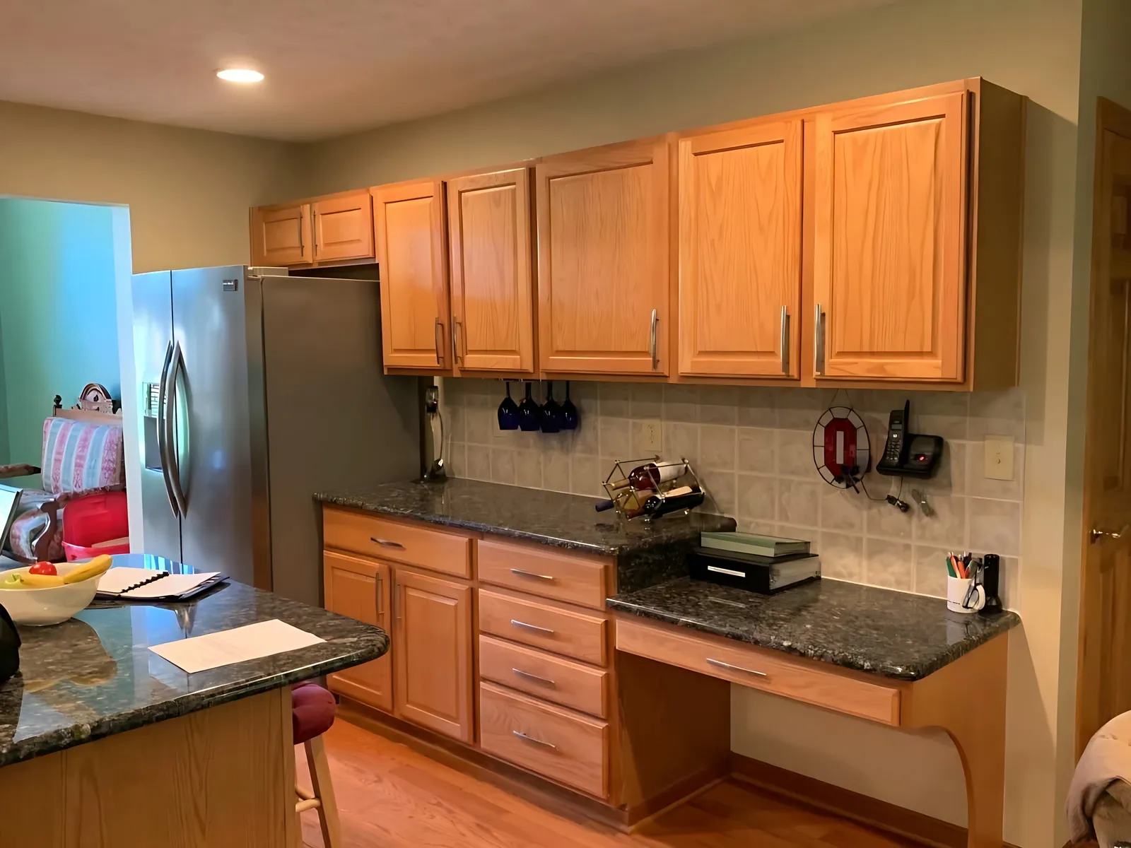 Before: oak cabinets to white