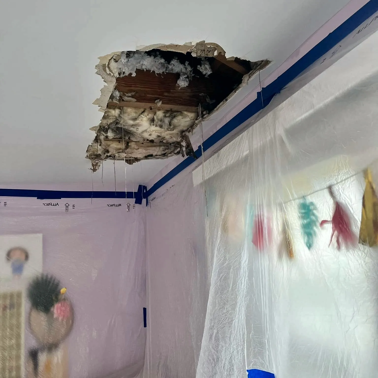 Before: ceiling water damage repaired