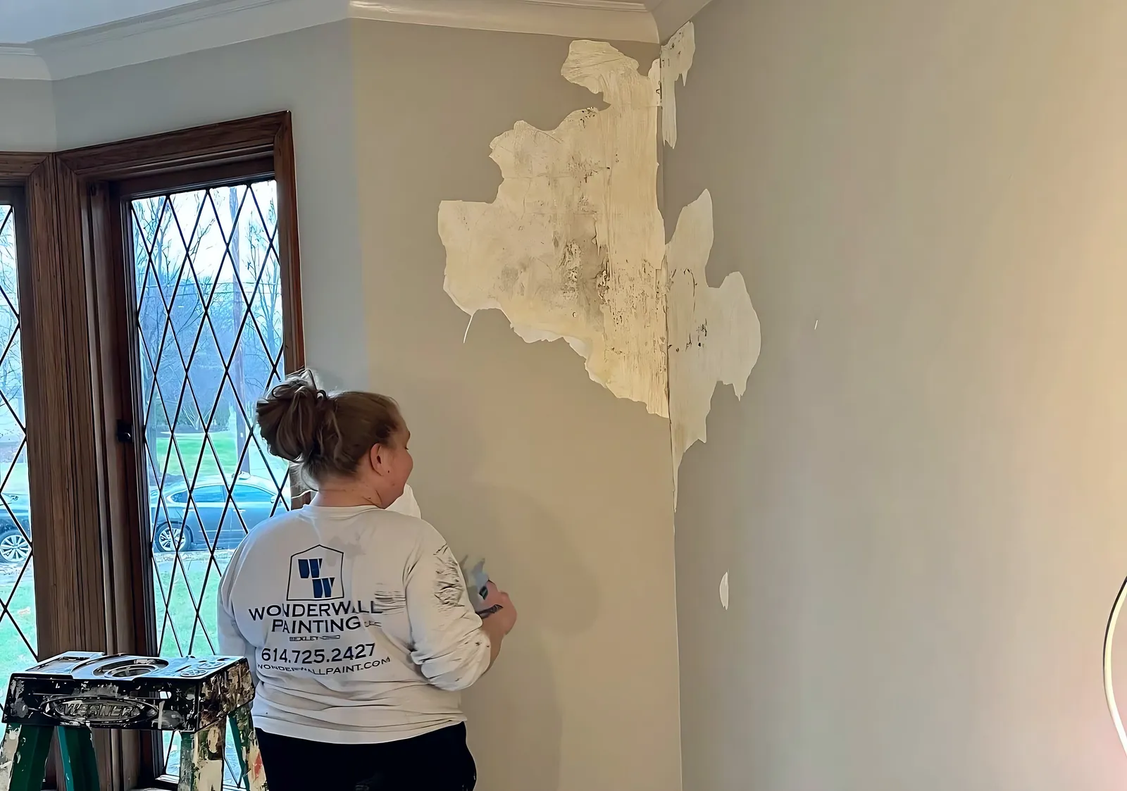 Before: peeling living room walls to finished